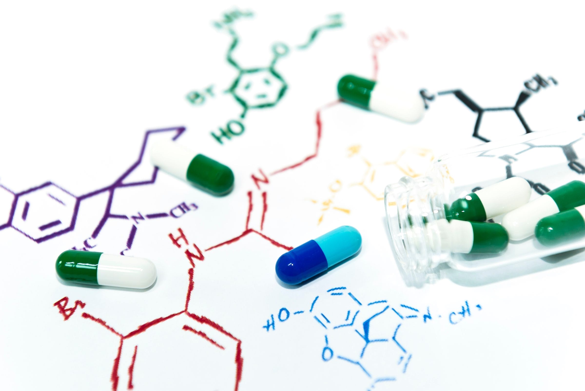 New chemical combination capsule drug on the colorful hand drawing chemical structure formula
